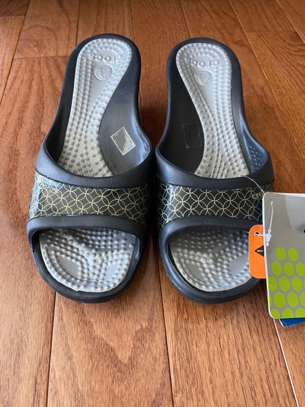 Women’s CROCS Black Slides with Gold Geometric Accent